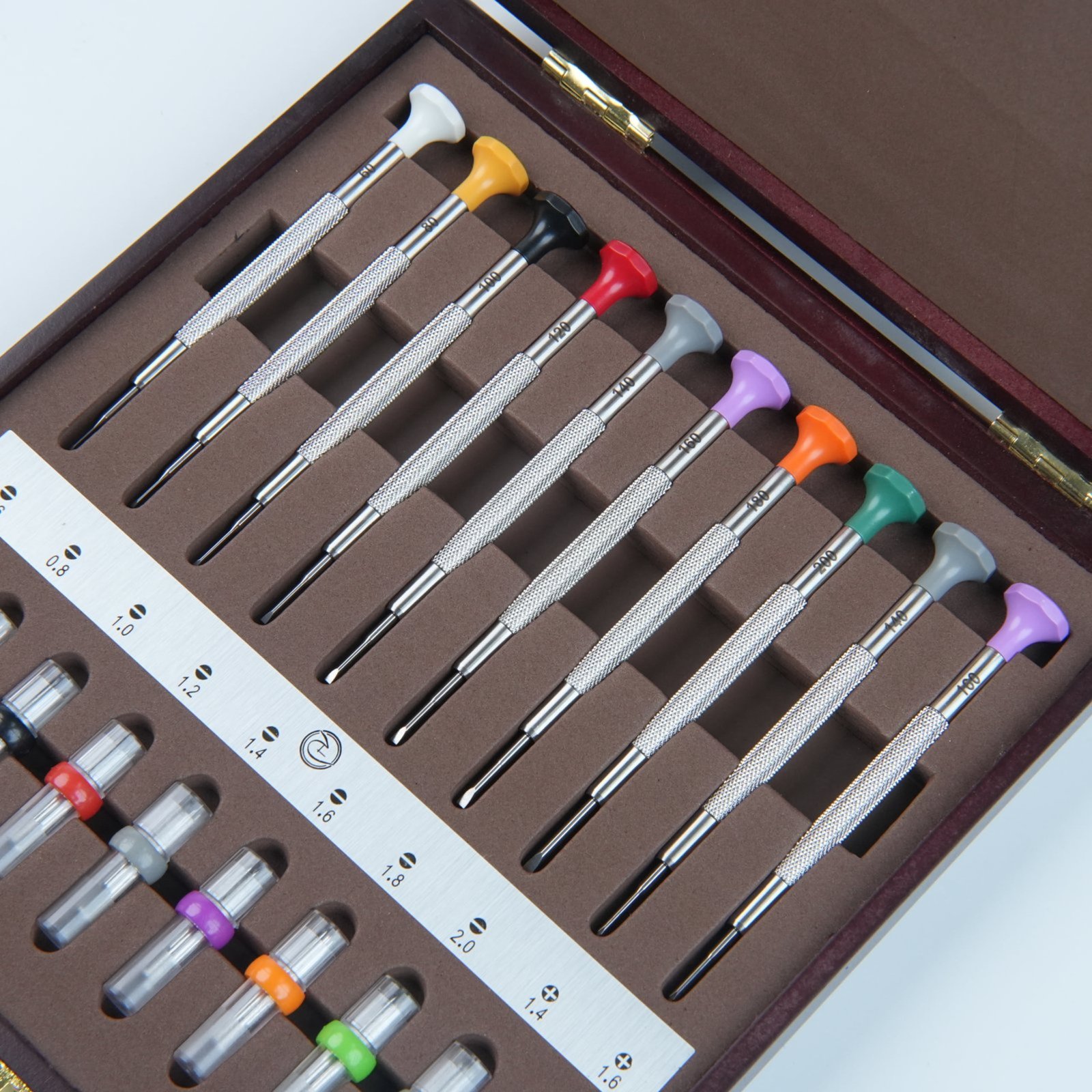 Custom branded packaging options including wooden box, metal tin, and paper carton